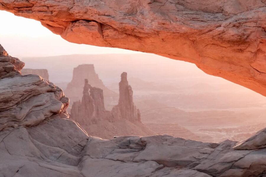 desert landscape stretches out, with sand dunes rippling under the relentless sun. The elusive glimmer of a mirage hovers in the distant horizon, symbolizing the deceptive allure of quick-fix detox kits.