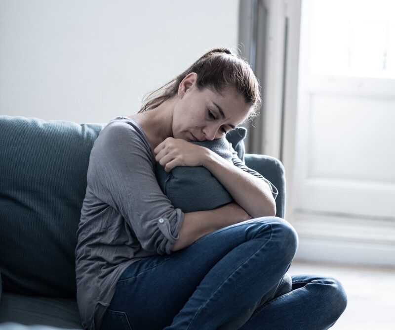 Woman isolating herself after detox