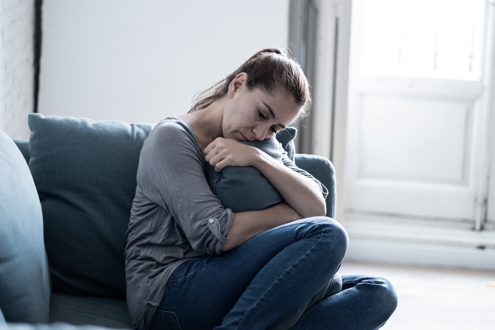 Woman isolating herself after detox